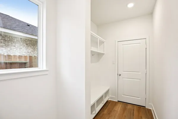 a view of a room that has a window in it