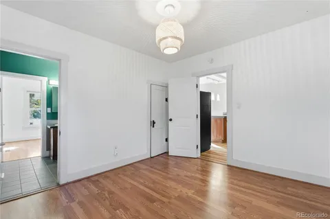 a view of a livingroom with wooden floor