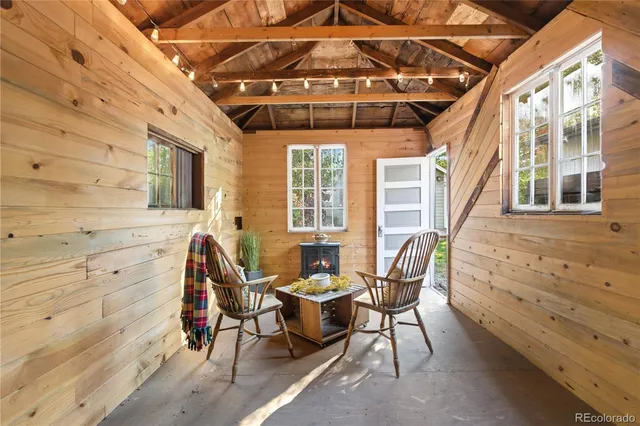 a outdoor space with lots of white furniture
