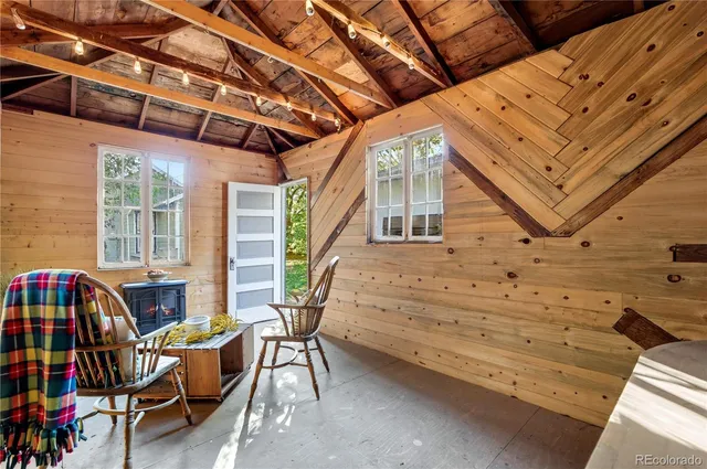 a view of a chairs and table in the patio