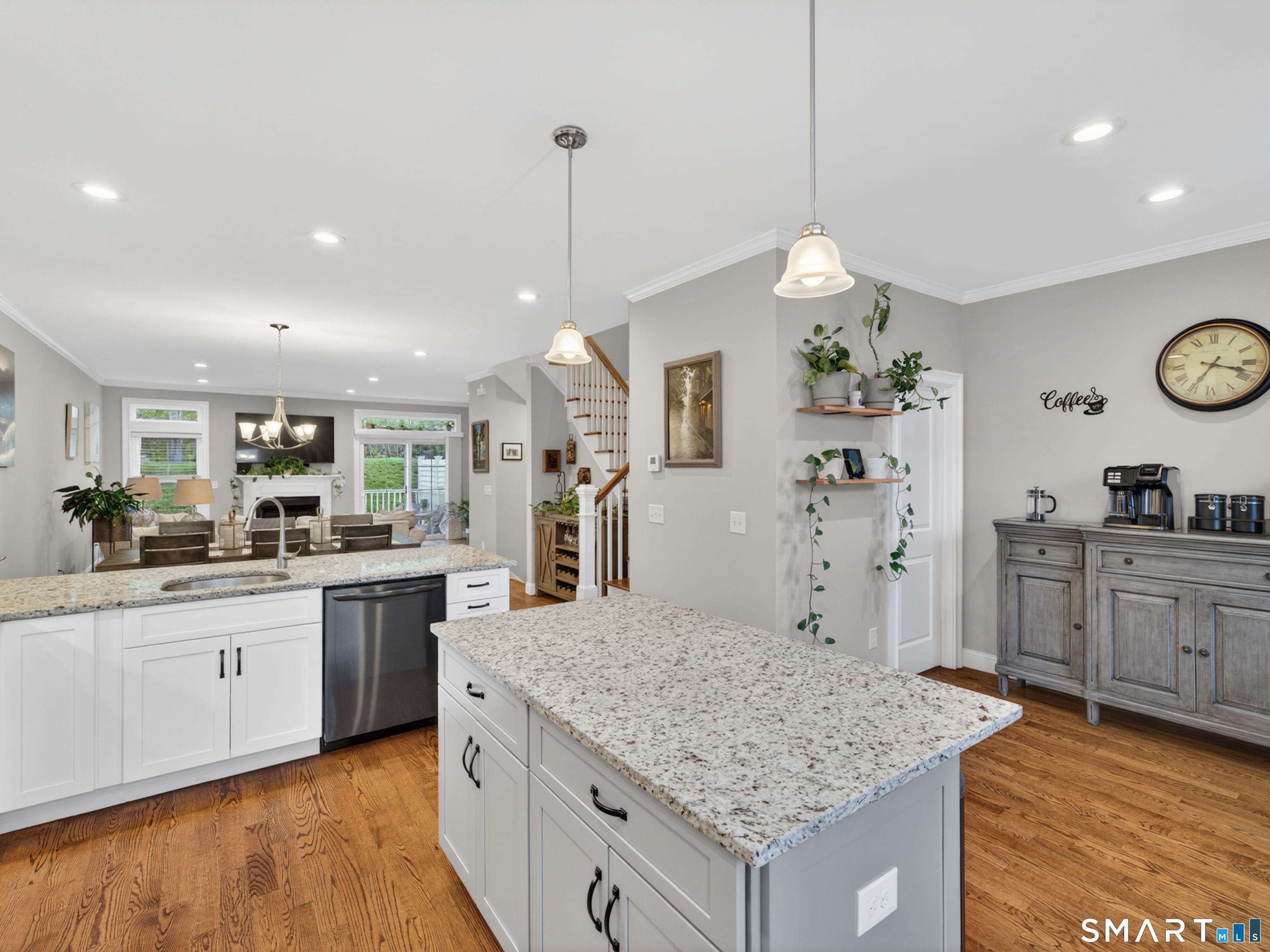 34 Village Crossing, Unit 34 Niantic, CT 06357 - Photo 19 of 38 a kitchen with stainless steel appliances granite countertop a sink stove and refrigerator