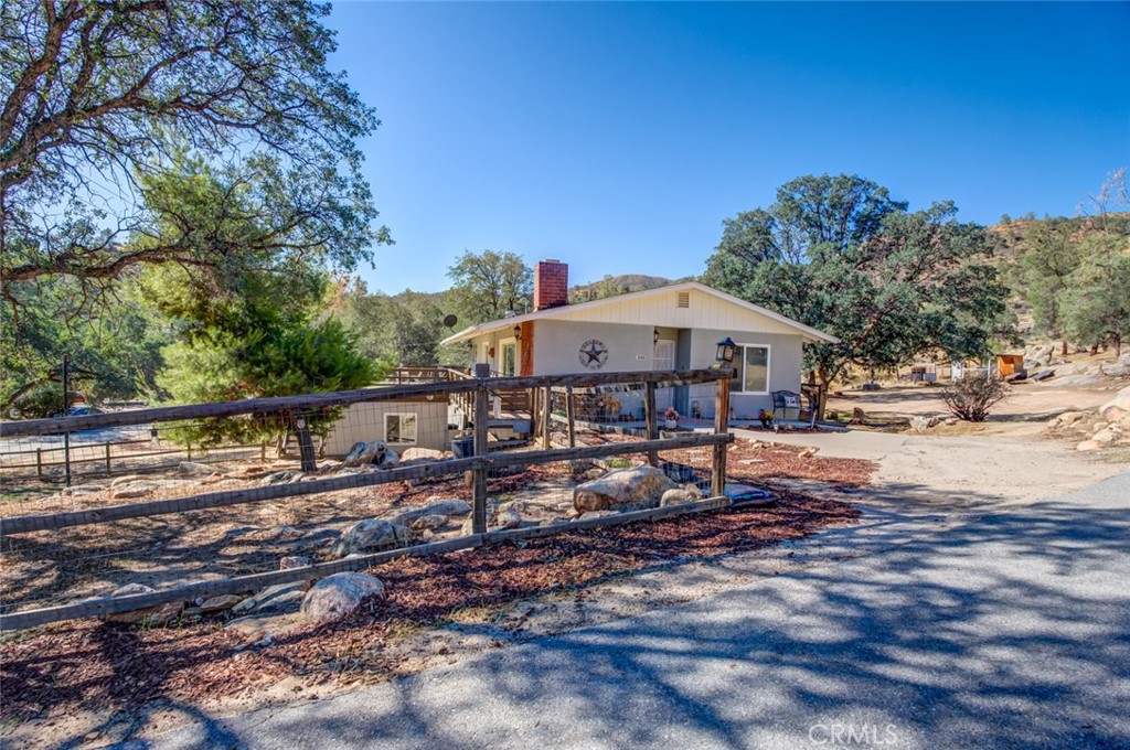 245 Mountain Shadow Road Wofford Heights, CA 93285 - Photo 34 of 72 a view of a house with backyard and sitting area