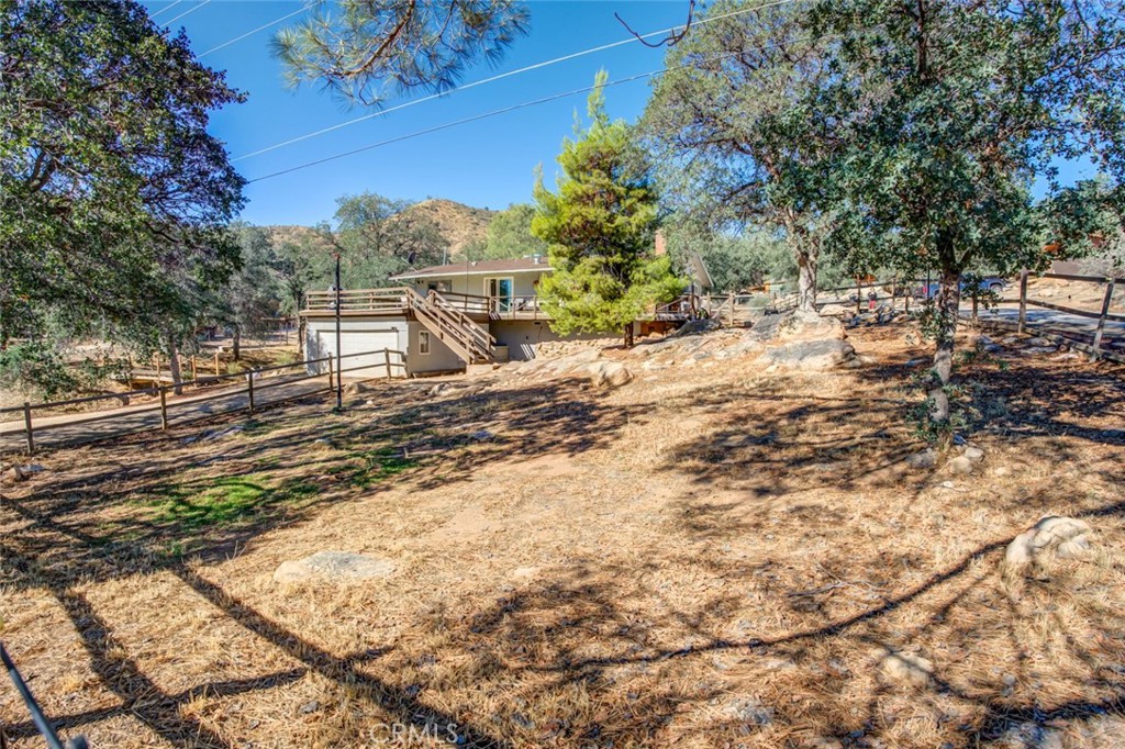 245 Mountain Shadow Road Wofford Heights, CA 93285 - Photo 36 of 72 a view of a backyard of the house