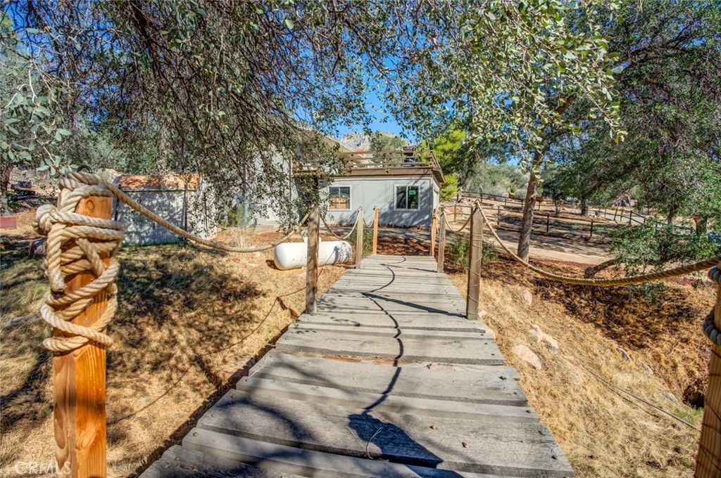 245 Mountain Shadow Road Wofford Heights, CA 93285 - Photo 40 of 72 a view of a backyard with sitting area