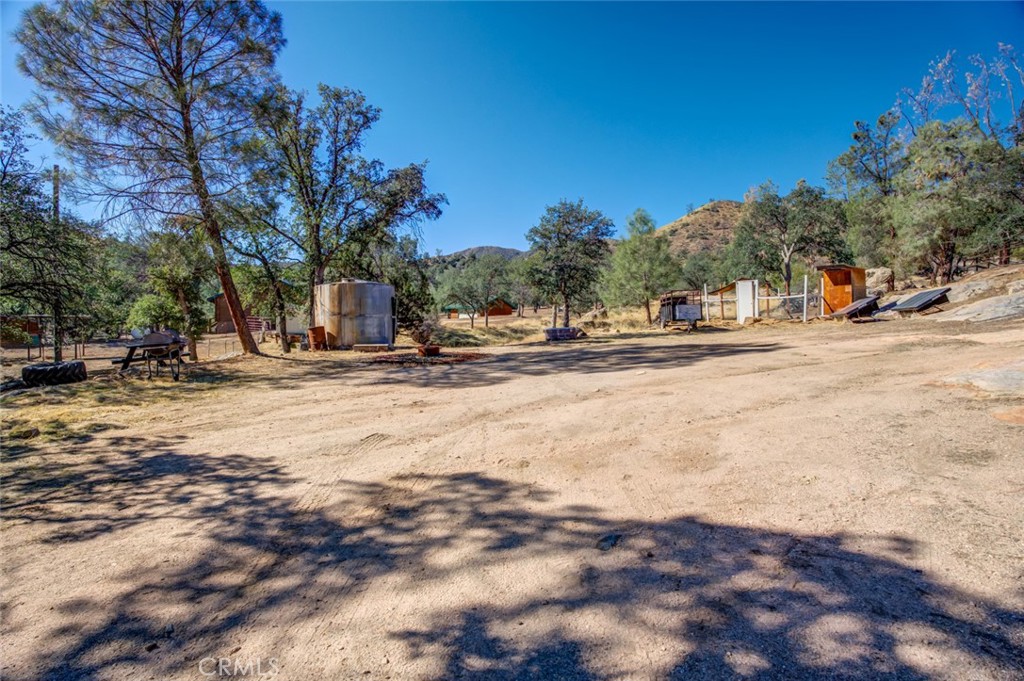 245 Mountain Shadow Road Wofford Heights, CA 93285 - Photo 44 of 72 a view of road with trees