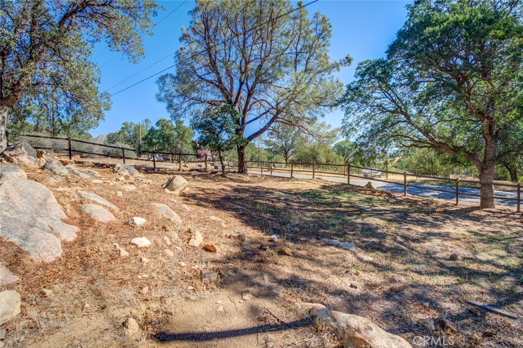 245 Mountain Shadow Road Wofford Heights, CA 93285 - Photo 47 of 72 a view of a yard with trees