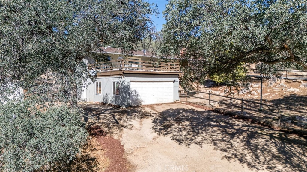 245 Mountain Shadow Road Wofford Heights, CA 93285 - Photo 50 of 72 a view of a house with a yard