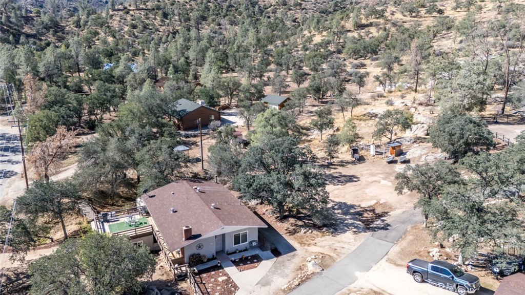 245 Mountain Shadow Road Wofford Heights, CA 93285 - Photo 56 of 72 an aerial view of a house with a yard