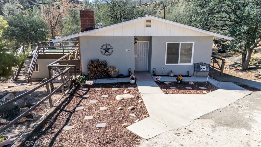 245 Mountain Shadow Road Wofford Heights, CA 93285 - Photo 60 of 72 a view of a terrace with chairs and potted plants