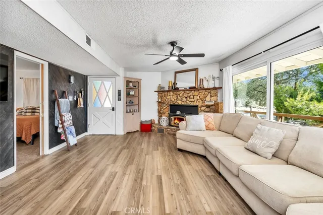 a kitchen with stainless steel appliances a refrigerator sink and microwave