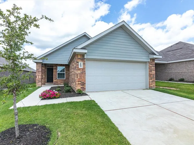 a front view of house with yard