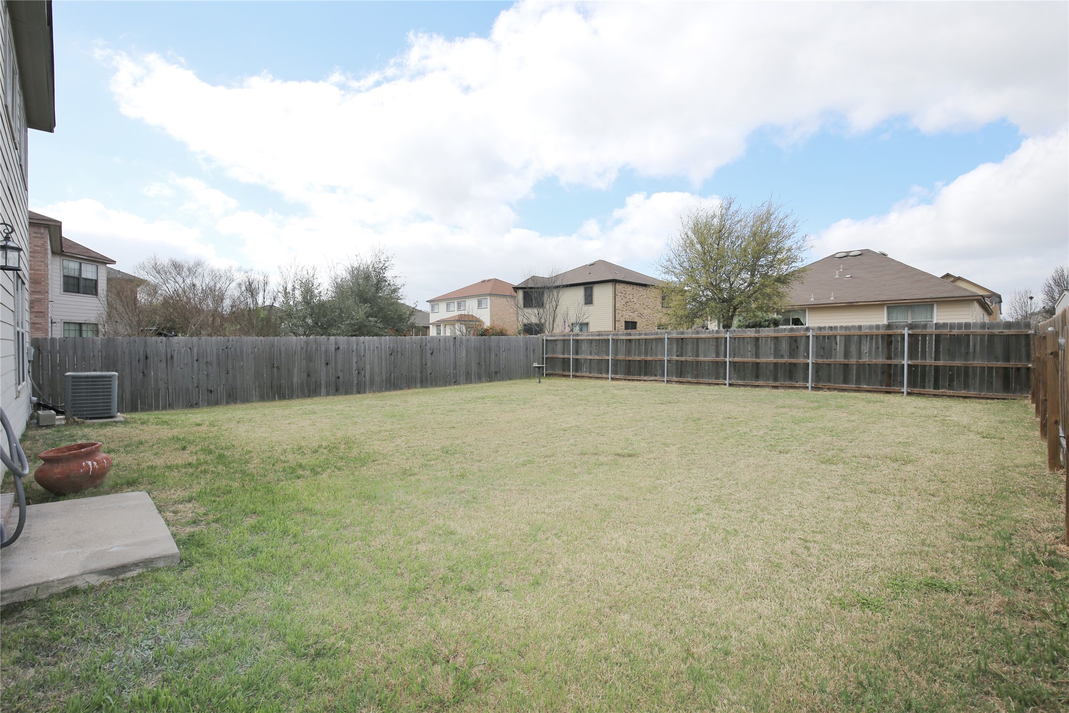 213 Rim Rock Drive Leander, TX 78641 - Photo 20 of 21 a view of a yard with a trampoline
