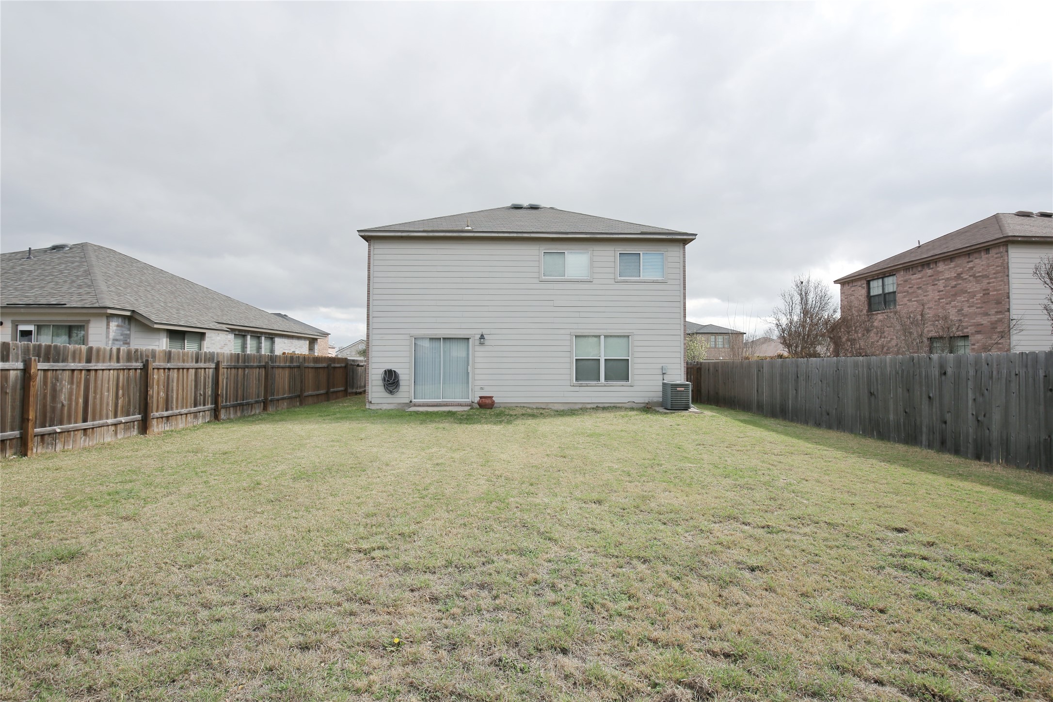 213 Rim Rock Drive Leander, TX 78641 - Photo 21 of 21 a view of an house with backyard and space