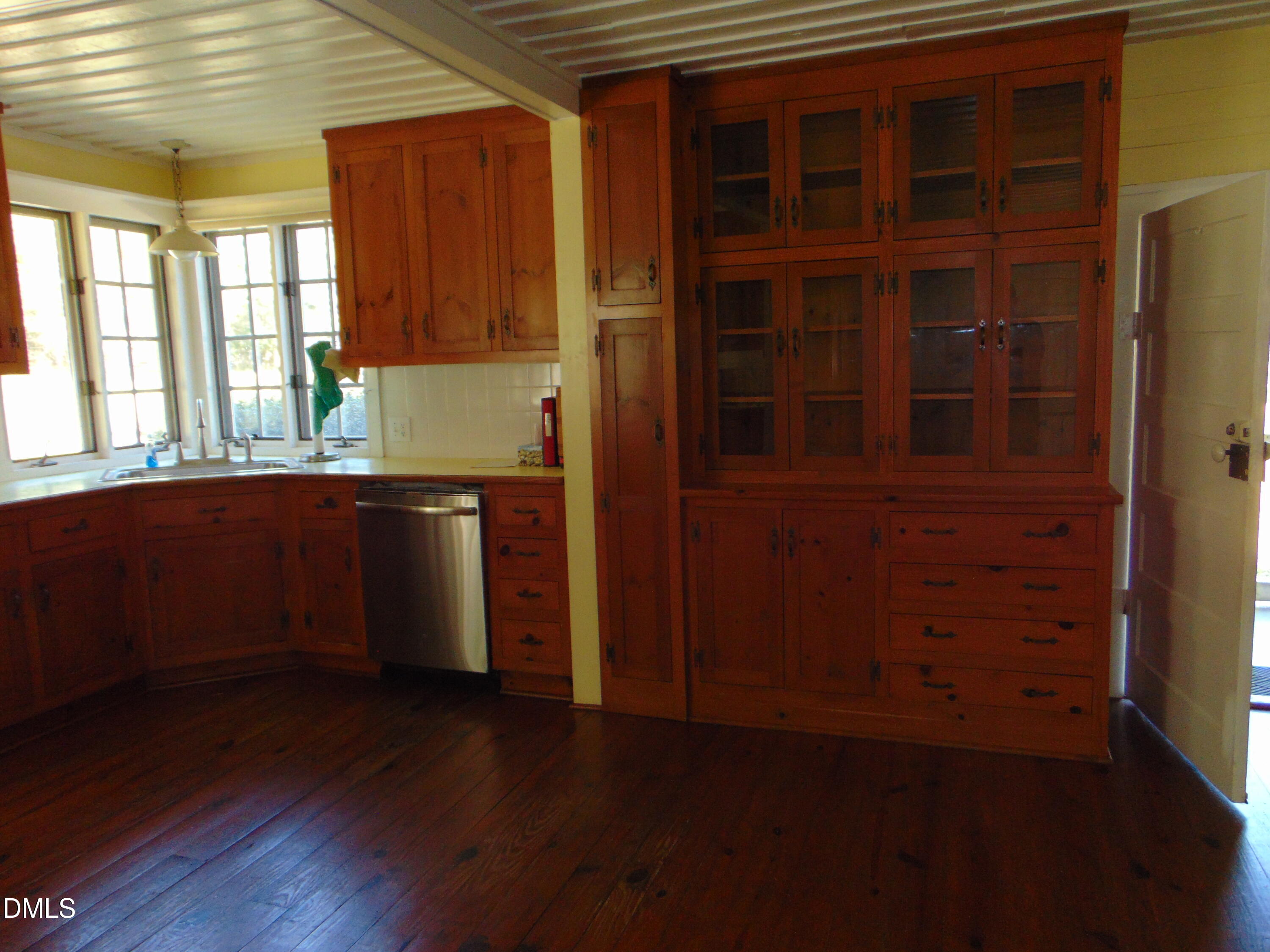 4067 Chewning Road Oxford, NC 27565 - Photo 78 of 82 an empty room with a window and wooden floor