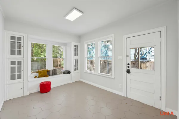 a white bench sitting in front of a room