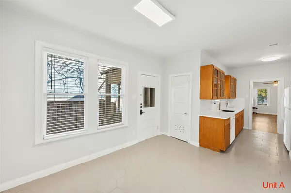 a living room with furniture and flat screen tv