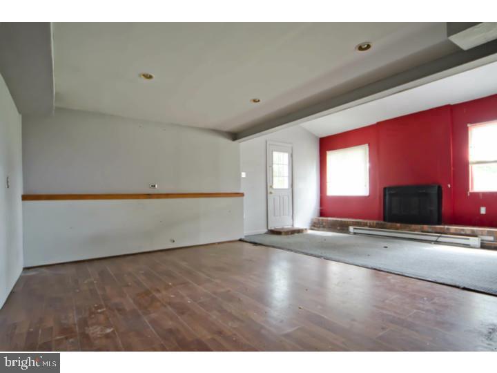 1180 South Trooper Road Norristown, PA 19403 - Photo 14 of 19 The family room lower level before it was gutted