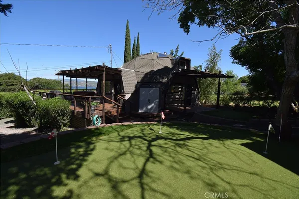 a kitchen with stainless steel appliances granite countertop a stove a sink and a stove