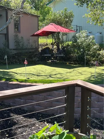 a dining room with wooden floor and a table