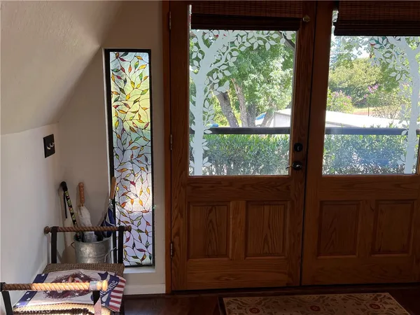 a kitchen with stainless steel appliances a sink stove and cabinets