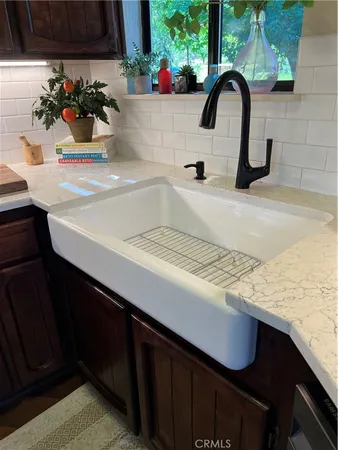 a room with furniture and wooden floor