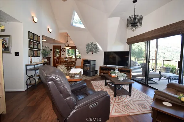 a large bed sitting in a bedroom and lamp
