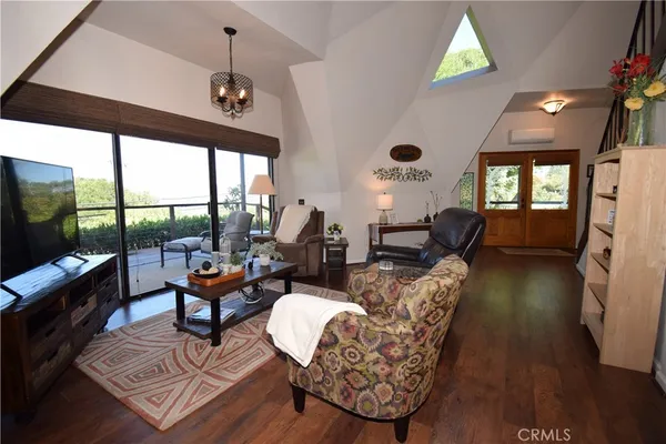 a bed room with a bed and a lamp