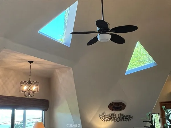 a bathroom with a double vanity sink a toilet and a mirror