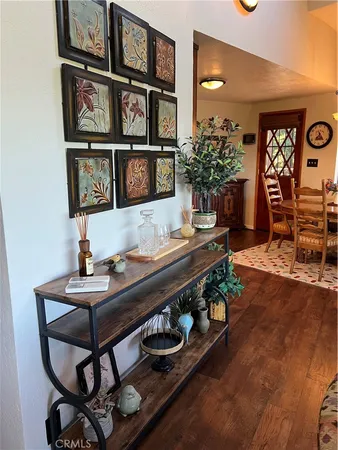 a bathroom with a double vanity sink toilet and a mirror
