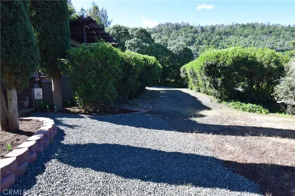 a view of a house with a snow in the yard