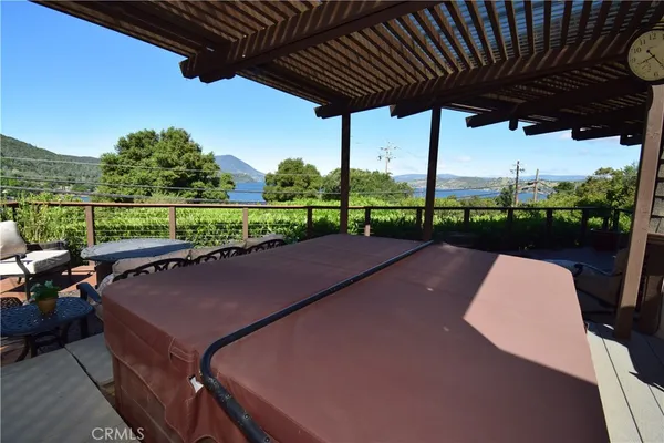 a view of a balcony with chairs