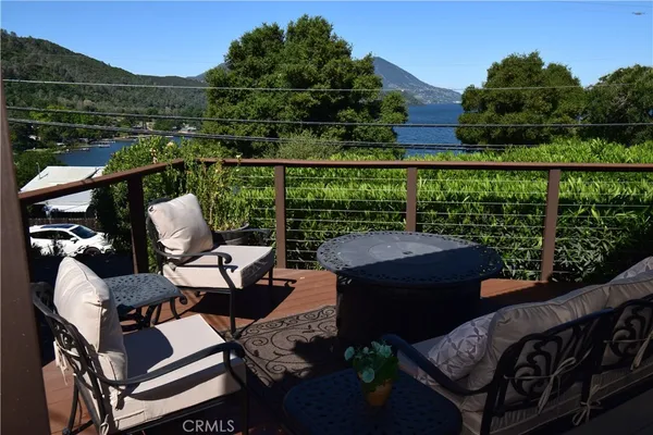 a view of a balcony with chairs