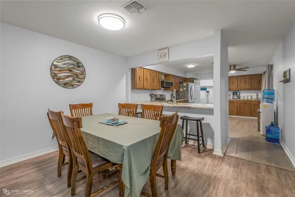 a view of a dining room with furniture