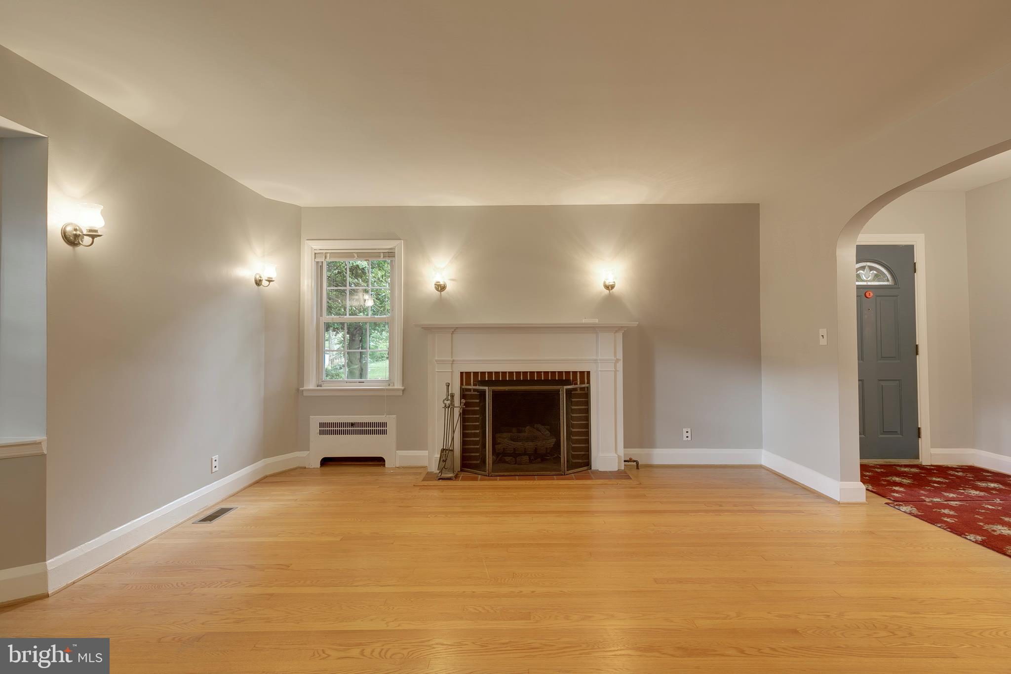 310 Murdock Road Baltimore, MD 21212 - Photo 10 of 50 Woodburning Fireplace- Living Room