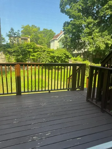 a view of wooden deck and lake