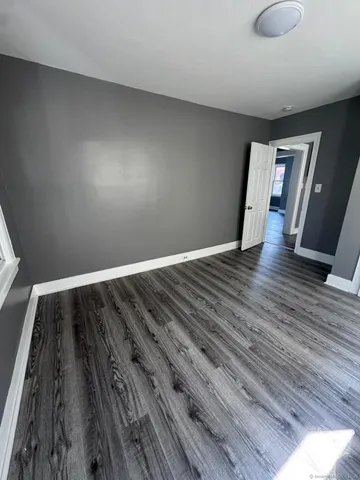 a view of wooden floor and staircase