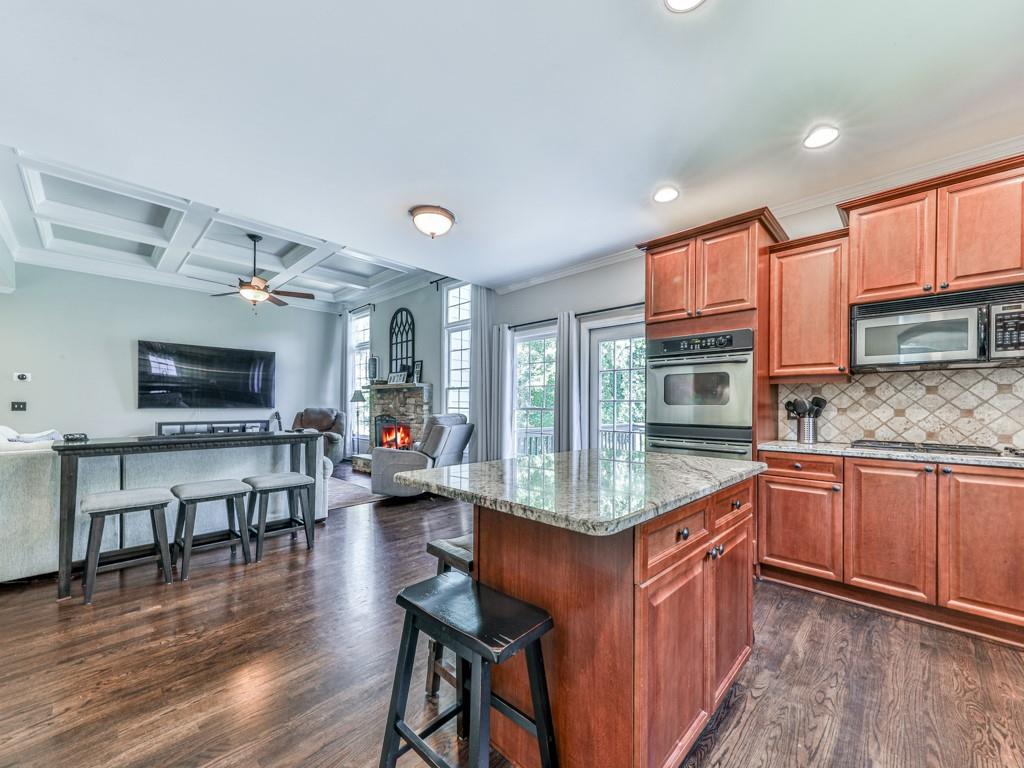 619 Riverbend Way Canton, GA 30114 - Photo 5 of 76 a kitchen with lots of counter top space