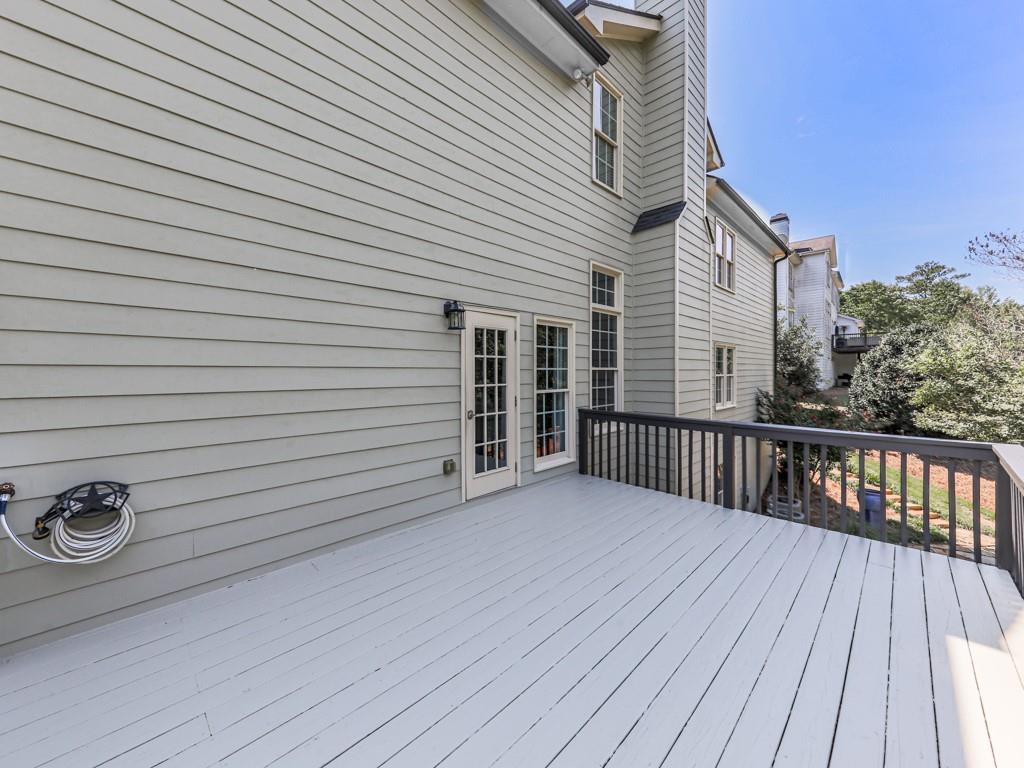 619 Riverbend Way Canton, GA 30114 - Photo 54 of 76 a view of a wooden deck