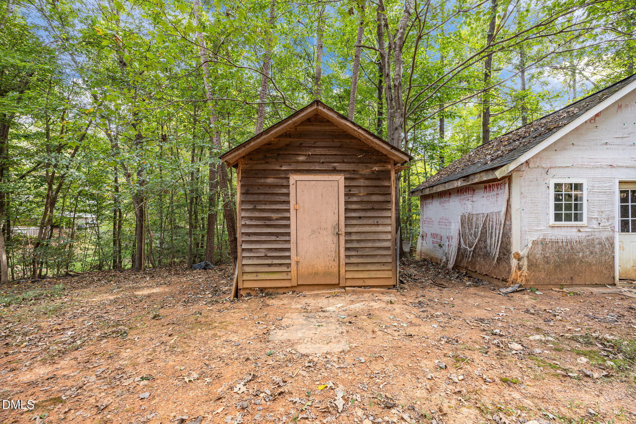 6933 Big Woods Road Graham, NC 27253 - Photo 11 of 32 a front view of a house with a yard