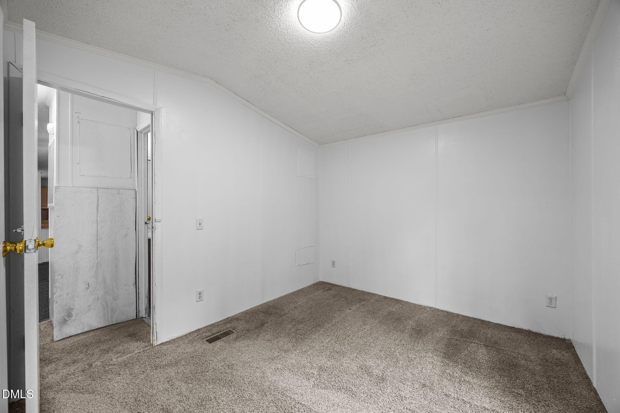 6933 Big Woods Road Graham, NC 27253 - Photo 23 of 32 an empty room with a empty space