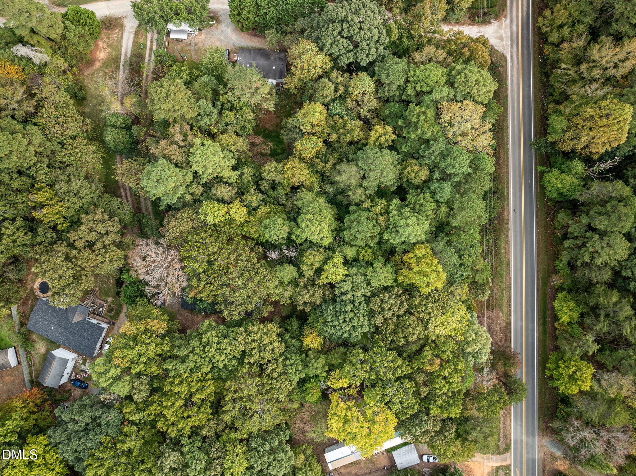 6933 Big Woods Road Graham, NC 27253 - Photo 26 of 32 a view of a garden