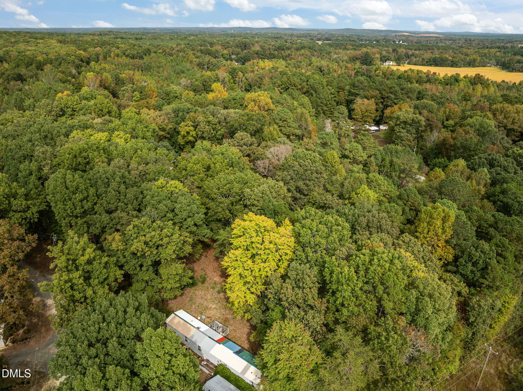 6933 Big Woods Road Graham, NC 27253 - Photo 29 of 32 a view of a yard with an outdoor space