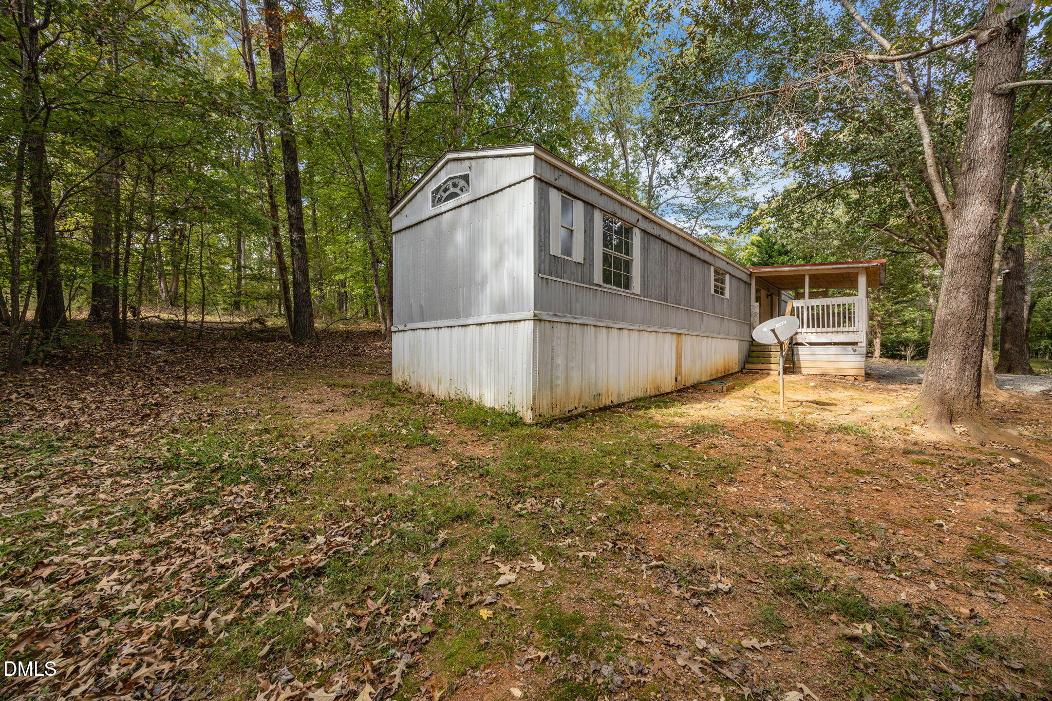 6933 Big Woods Road Graham, NC 27253 - Photo 5 of 32 a view of a backyard