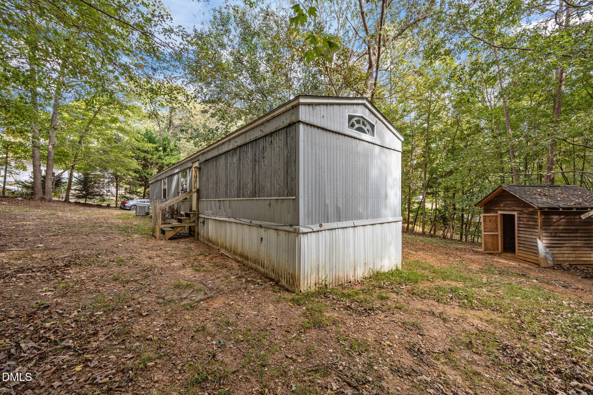 6933 Big Woods Road Graham, NC 27253 - Photo 7 of 32 a view of backyard of house