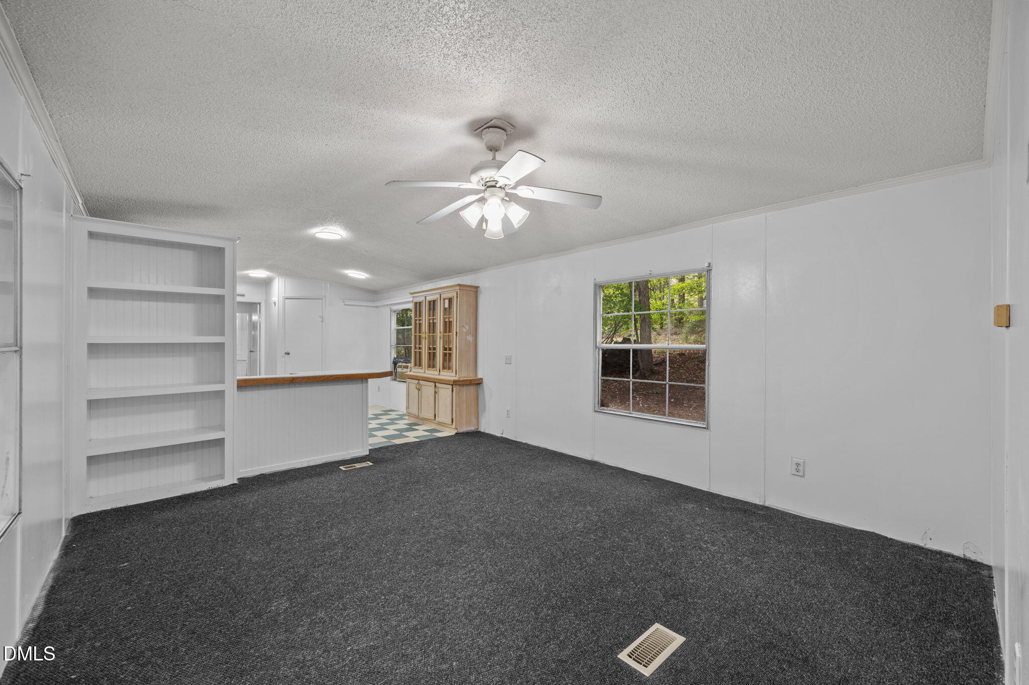 6933 Big Woods Road Graham, NC 27253 - Photo 8 of 32 a view of an empty room with a window