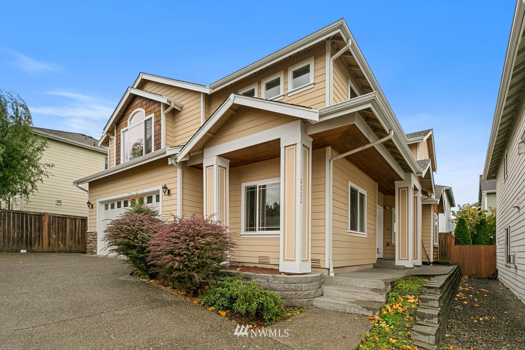 2222 Smithers Avenue South Renton, WA 98055 - Photo 2 of 25 a front view of a house with a yard