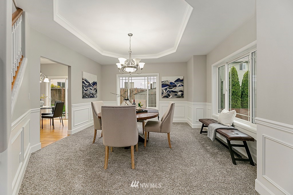 2222 Smithers Avenue South Renton, WA 98055 - Photo 12 of 25 a view of a dining room with furniture window and outside view