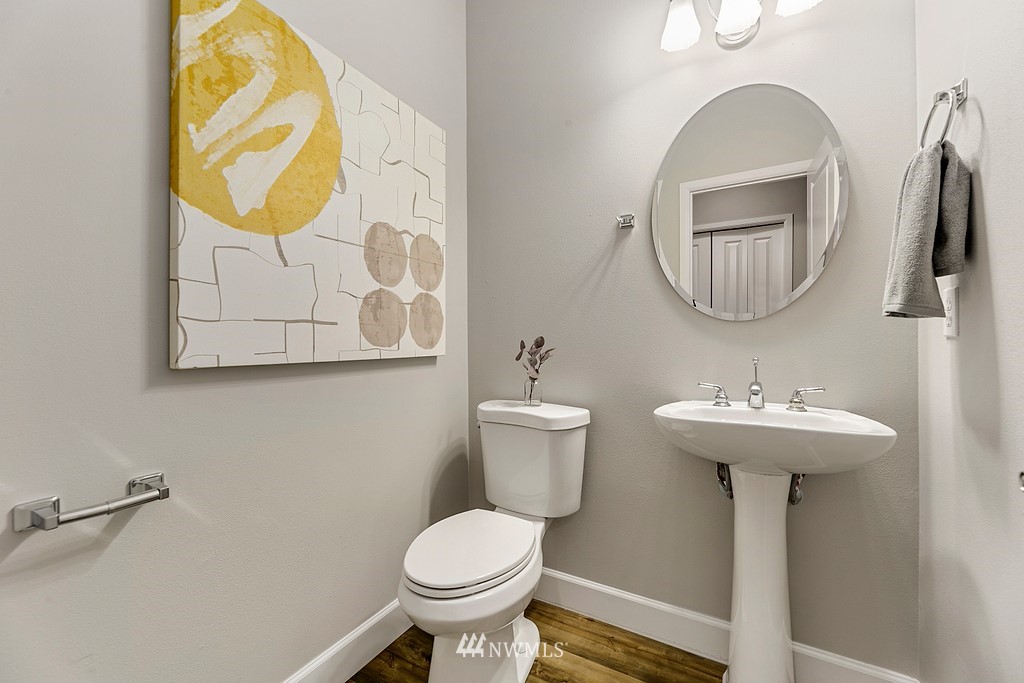 2222 Smithers Avenue South Renton, WA 98055 - Photo 14 of 25 a bathroom with a toilet sink and mirror