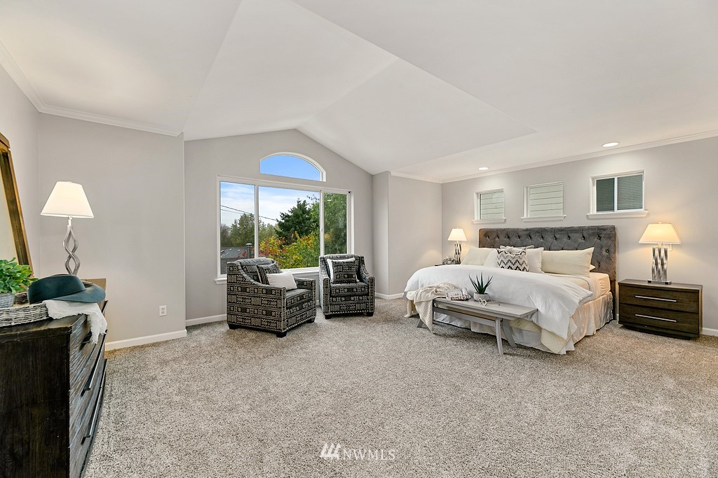 2222 Smithers Avenue South Renton, WA 98055 - Photo 17 of 25 a spacious bedroom with a bed and a couch