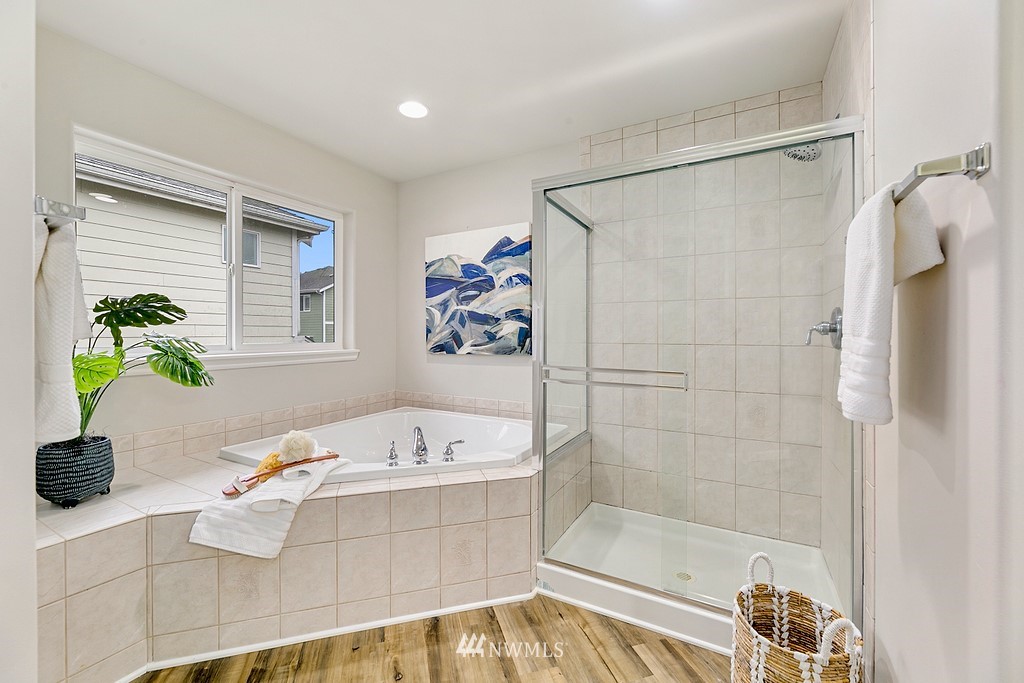 2222 Smithers Avenue South Renton, WA 98055 - Photo 20 of 25 a bathroom with a bathtub and a shower